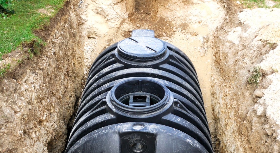 Septic tank set in an excavated trench